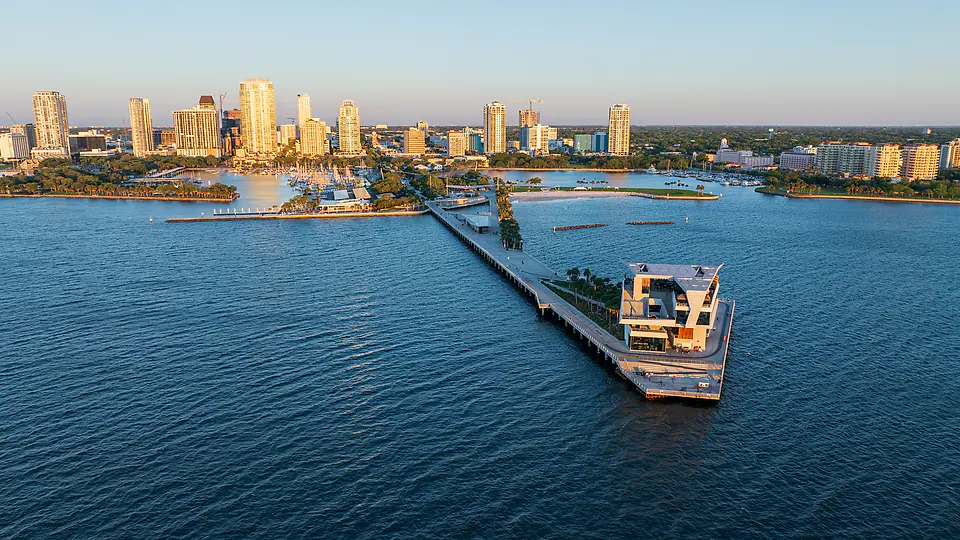 Aerial view of the St. Petersburg Pier and downtown skyline at sunrise