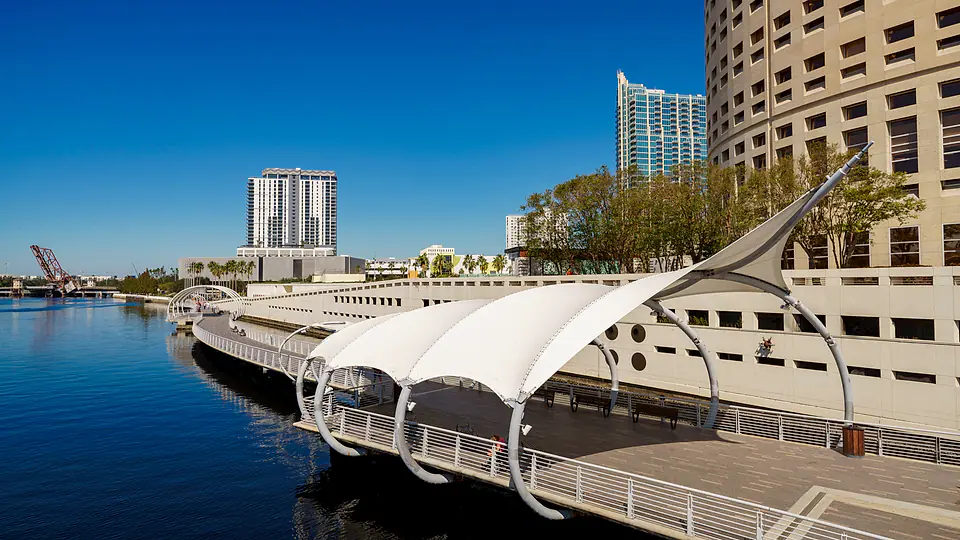 The Tampa Riverwalk winding along the Hillsborough River downtown